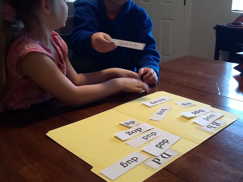 Two students playing a word game