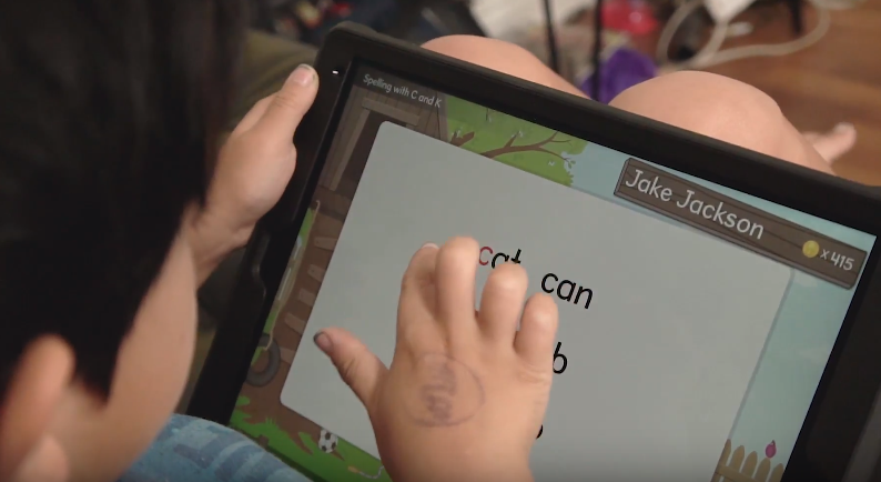 Boy working on Reading Horizons At Home on an iPad